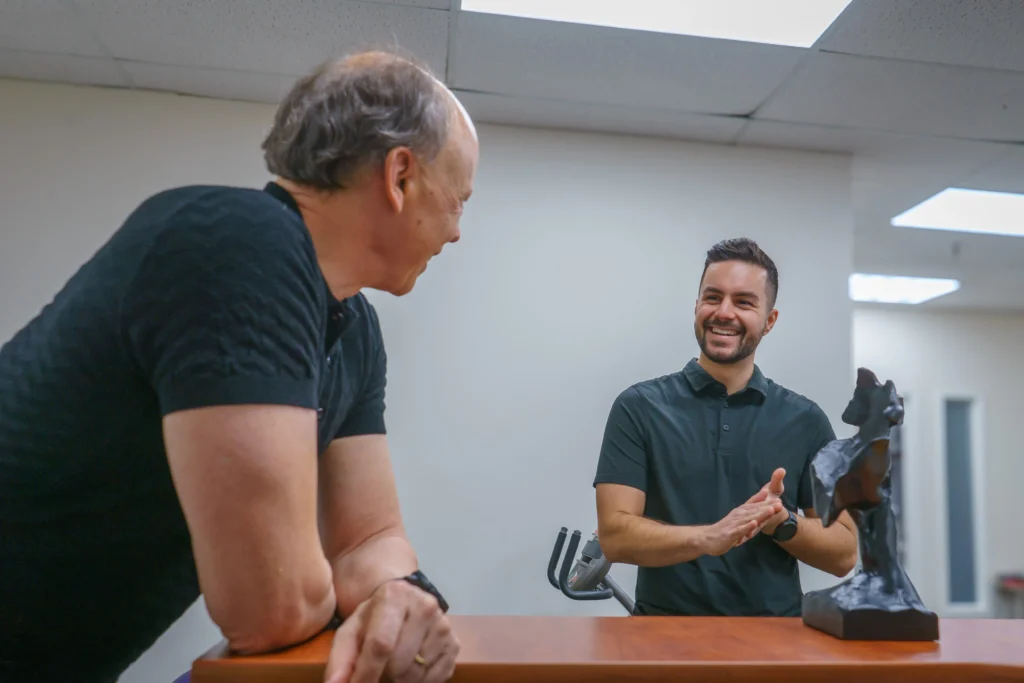 Michael Porreca providing personalized physiotherapy care to a patient at Accelerate Physiotherapy in Oakville.