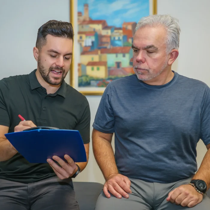 Michael Porreca providing personalized physiotherapy care to enhance recovery at Accelerate Physiotherapy in Oakville.