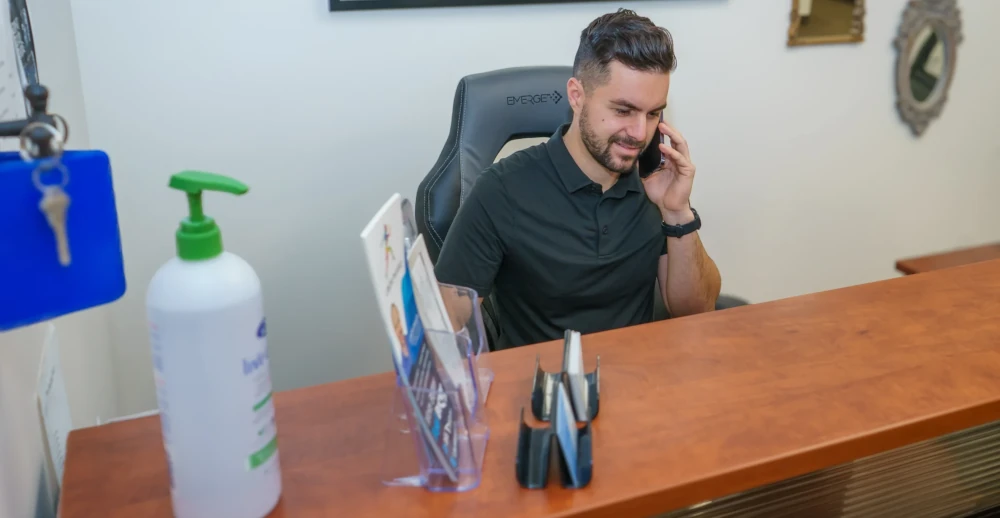 Michael Porreca providing personalized physiotherapy care to a patient in Oakville, focusing on recovery and rehabilitation.